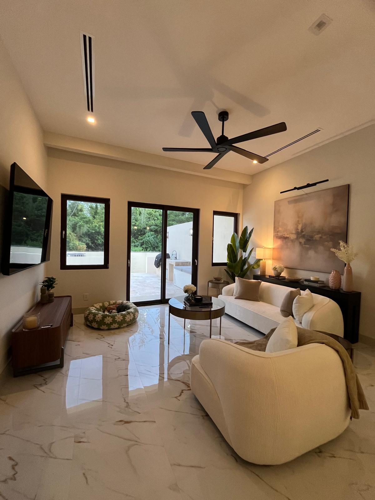 Longevity Suite living space opening onto a private terrace on the estate